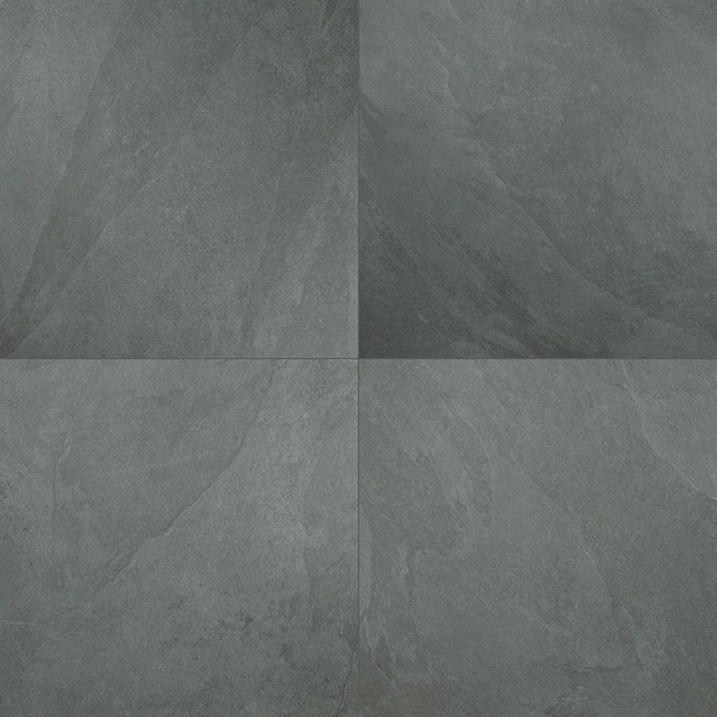 Four dark gray stone tiles arranged in a square, displaying textured surfaces.