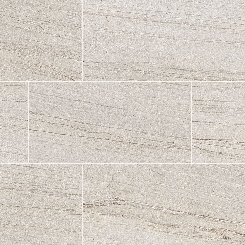 Light beige tile flooring with subtle, horizontal veining.