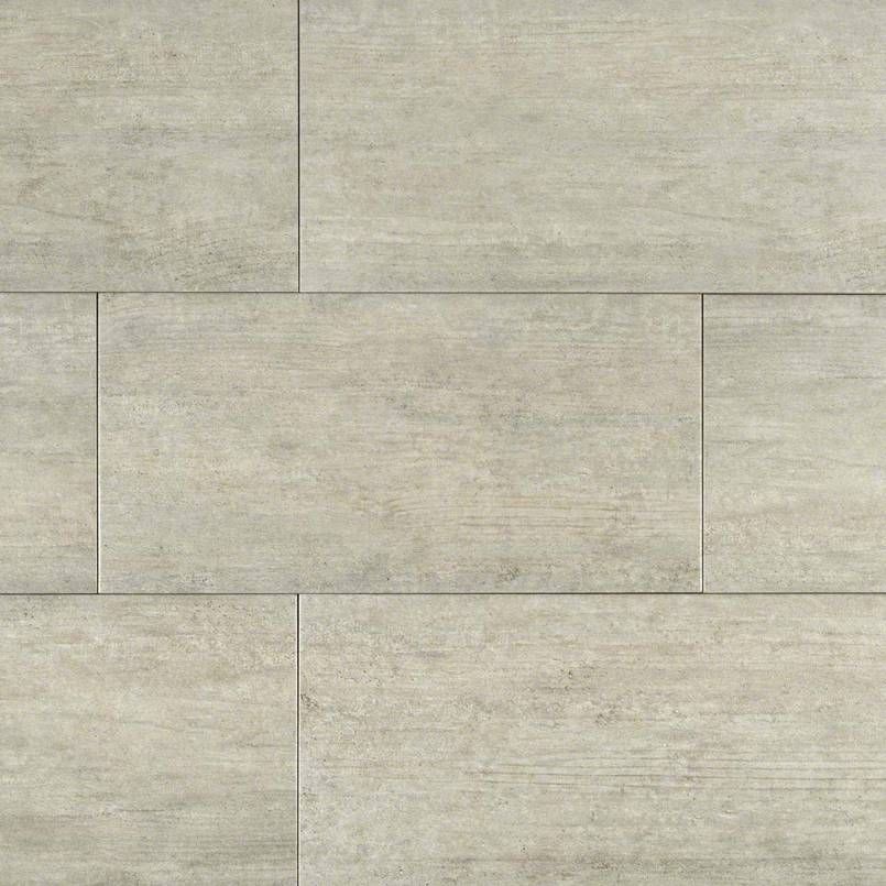 Light gray stone-look floor tiles arranged in a staggered pattern.