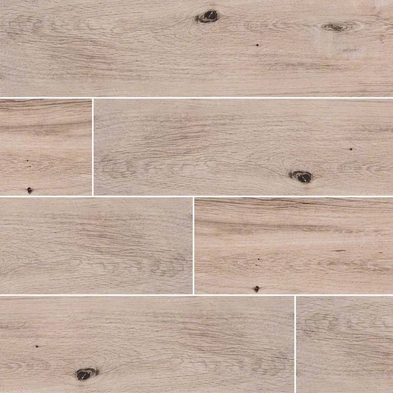 Light brown wood-look tile flooring. Rectangular tiles with visible wood grain and dark knots.