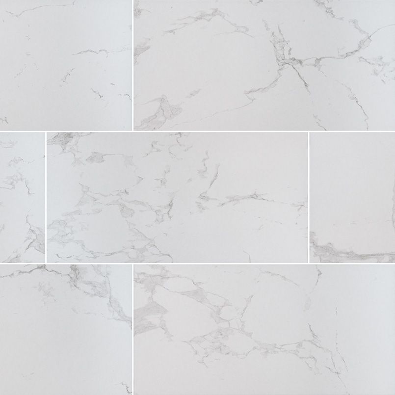 White marble tile with gray veining.