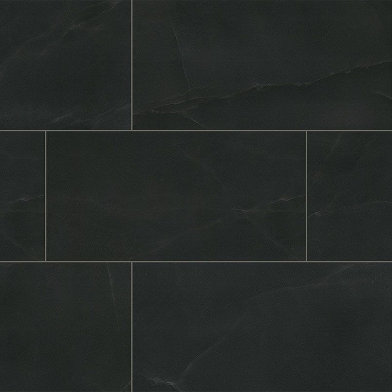 Black rectangular tiles with subtle veining, arranged in a brick pattern.