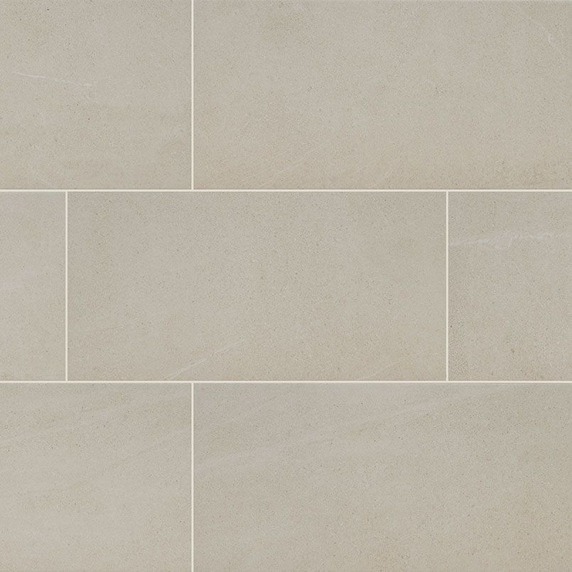 Beige rectangular stone tiles with white grout lines.