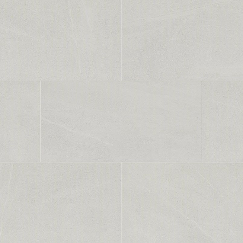 White rectangular ceramic tiles arranged in a brick pattern.