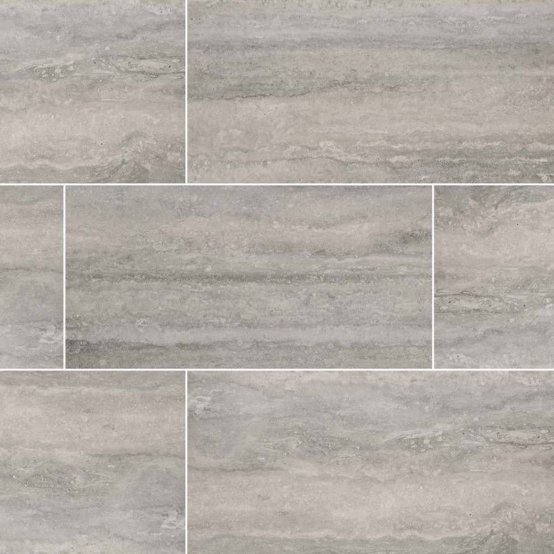 Gray and green rectangular travertine tile pattern with visible veining.