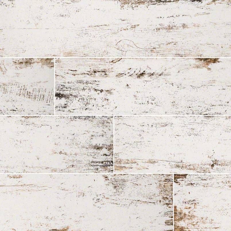 Whitewashed wood-look tile with brown grain details.