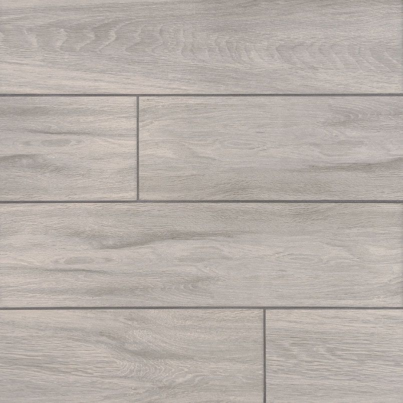 Light gray wood-look tile flooring, with varying plank widths and grain detail, laid in a staggered pattern.