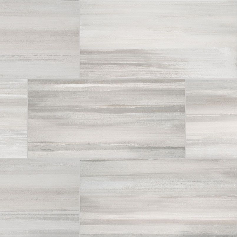 Light gray and white rectangular tiles with horizontal streaks, forming a subtle pattern.