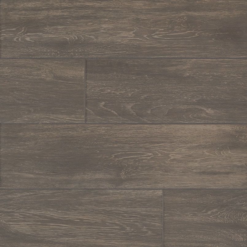 Dark gray wood floor planks with visible grain.