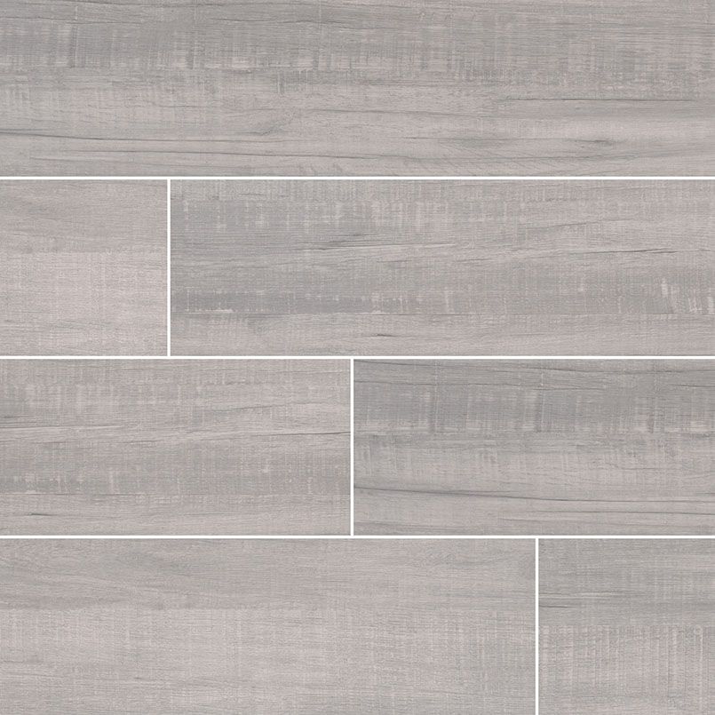 Gray wood-look ceramic tile flooring with a linear pattern.