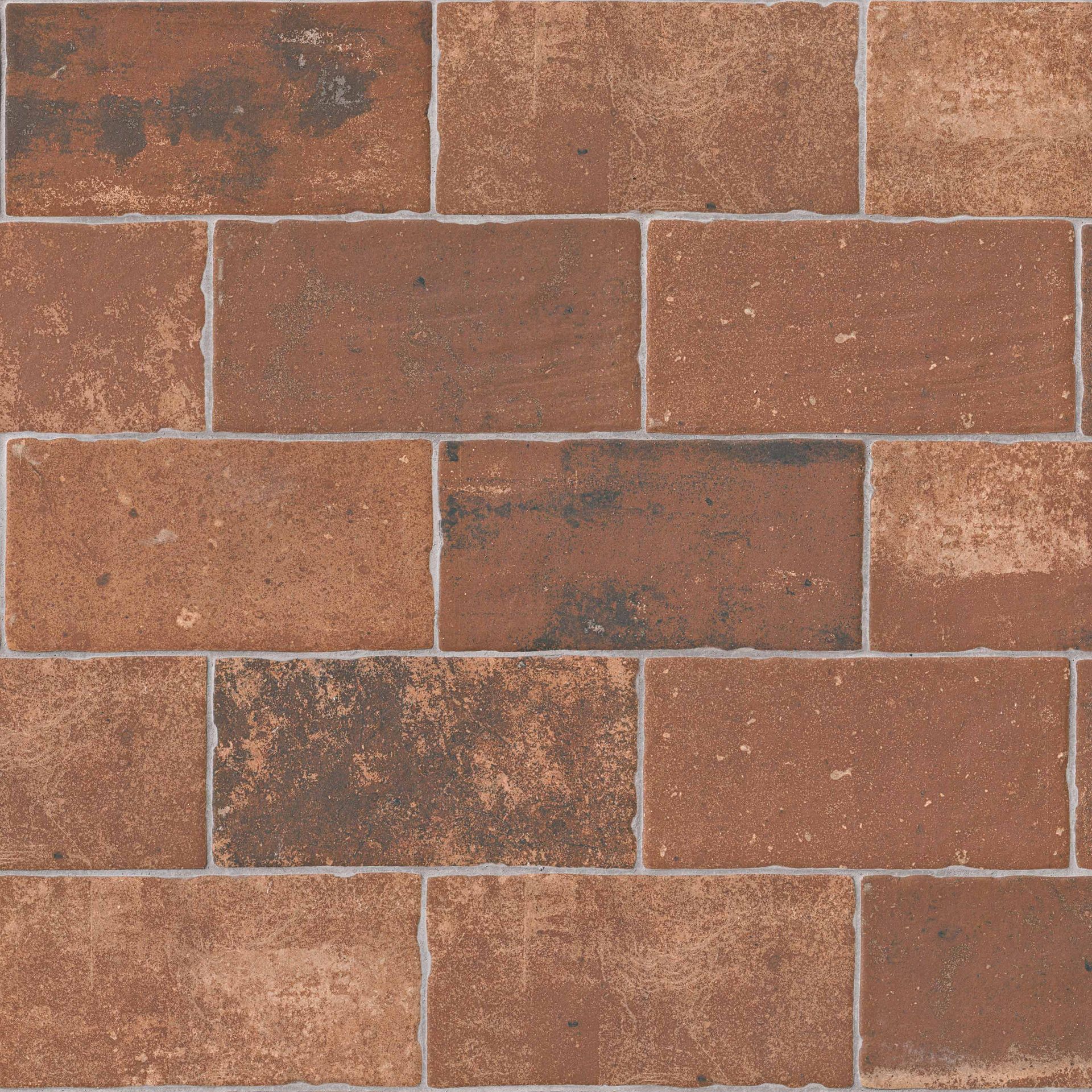 Brick wall pattern; reddish-brown rectangular bricks with slight color variations and off-white grout.