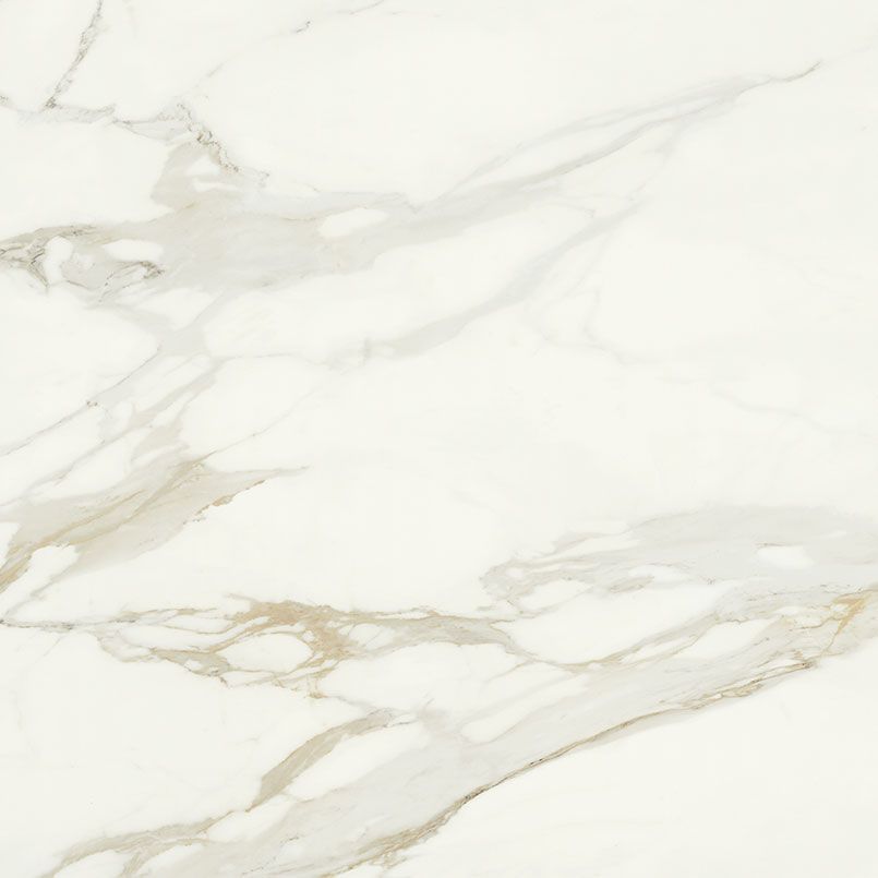 White marble tile with gold and gray veining.