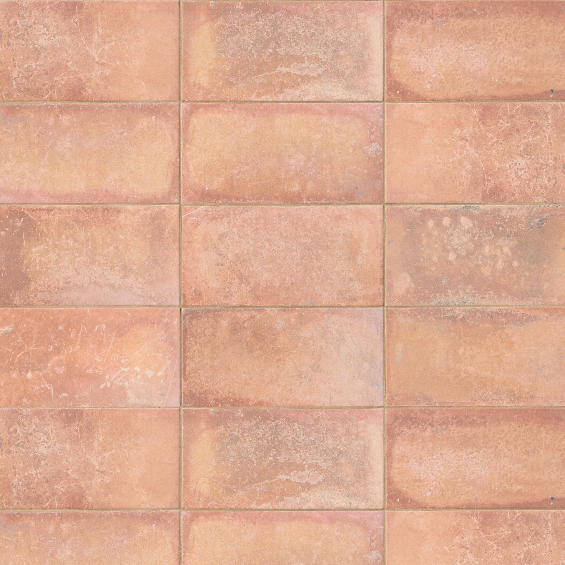 Close-up of terracotta-colored rectangular tiles arranged in a staggered pattern.