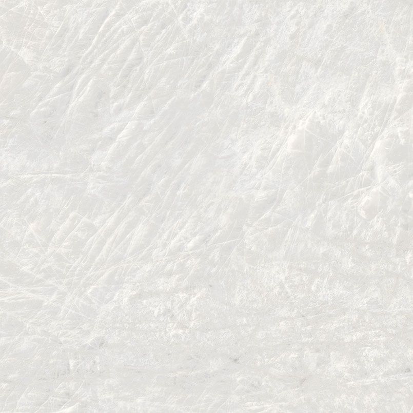 White marble surface with subtle, textured lines and patterns.