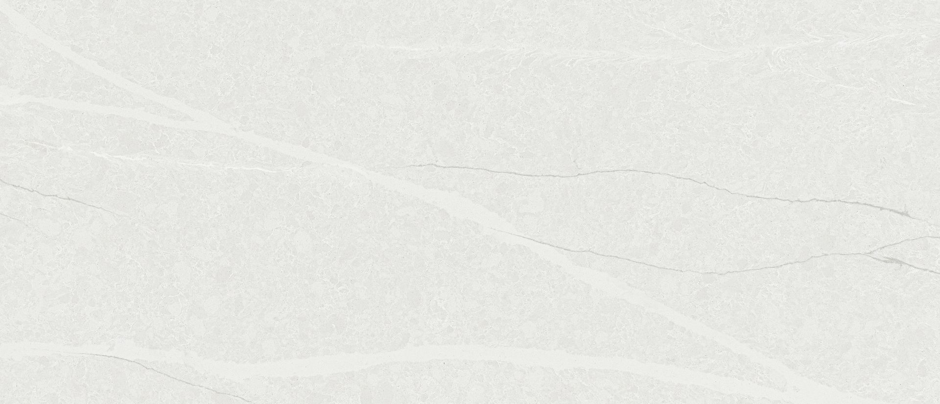 White marble-like stone surface with faint diagonal veining.