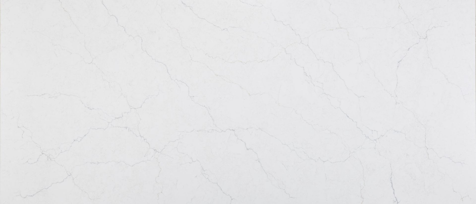 White marble countertop with subtle gray veining.