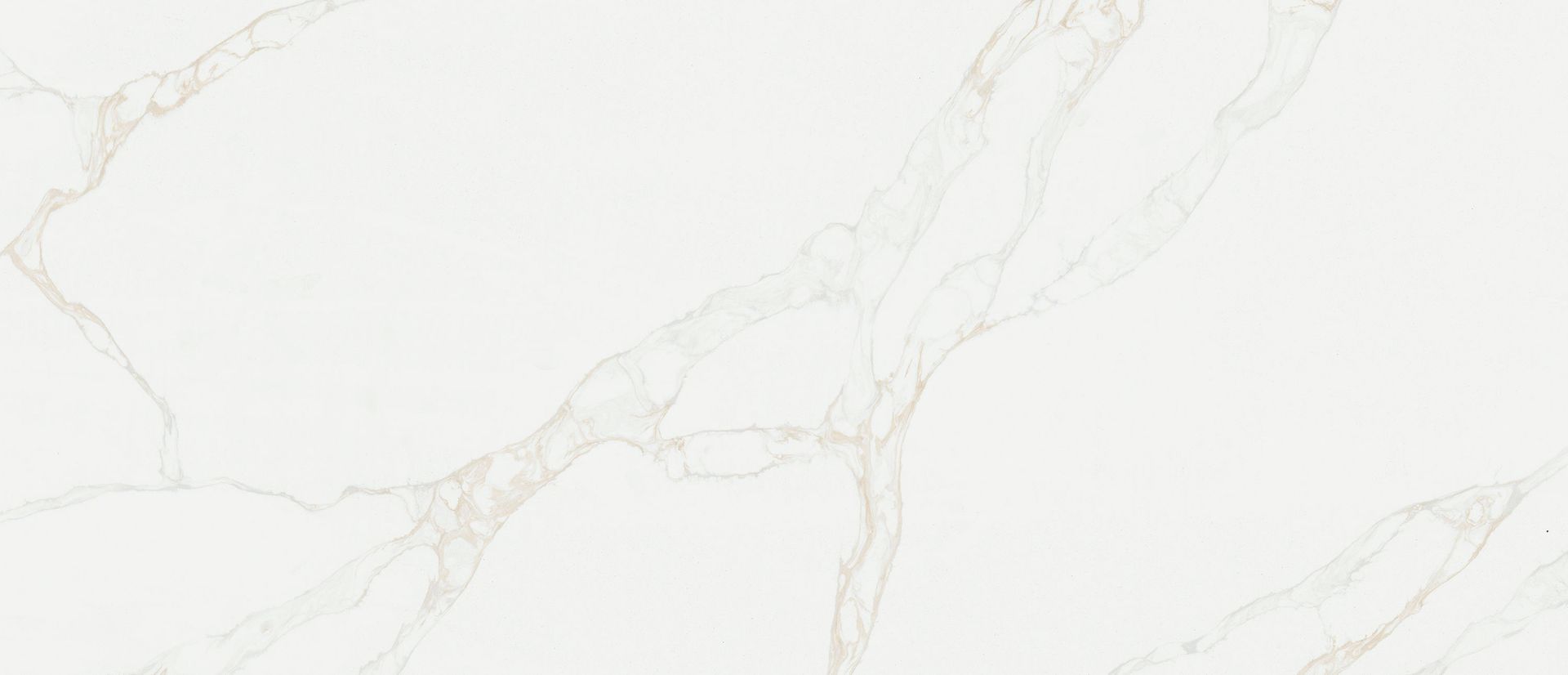 White marble surface with subtle gold veining.