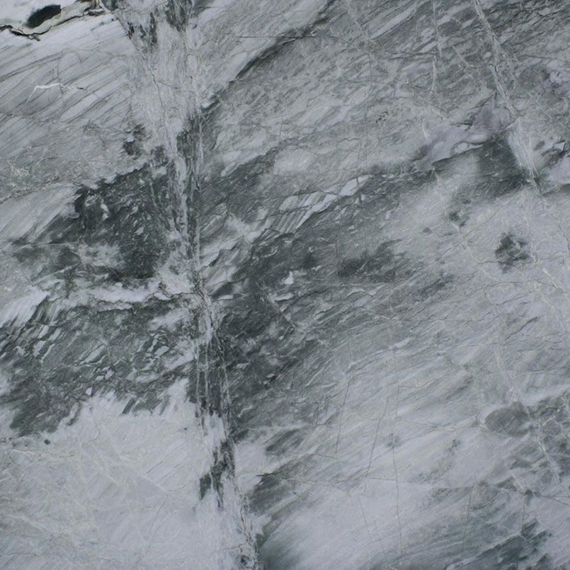 Gray and white marble with darker veining patterns.