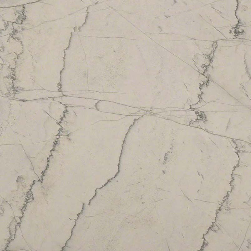 Cream-colored marble surface with gray veining and crack-like patterns.