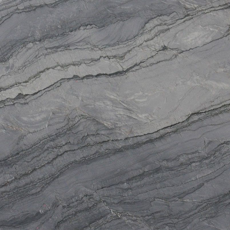 Gray marble slab with swirling diagonal patterns.