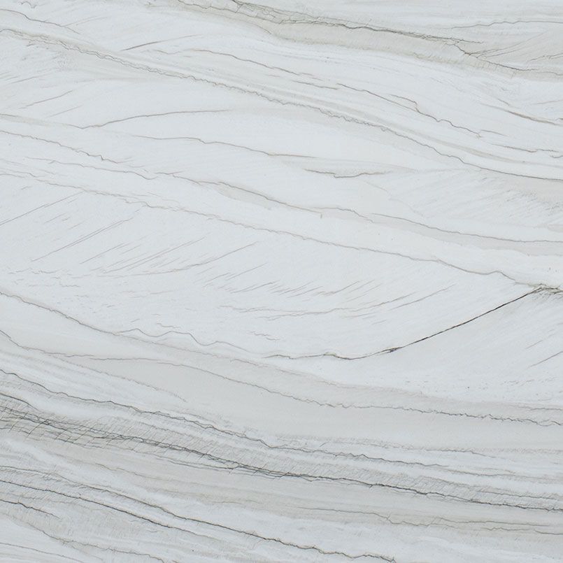 White and gray marble slab with swirling patterns.