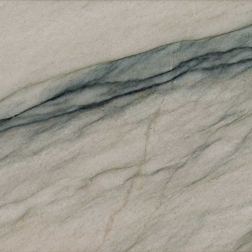 White and gray marble with a blue-gray vein running diagonally across the stone.