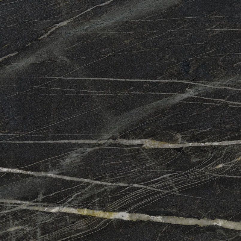 Dark gray marble with white and gold veining.
