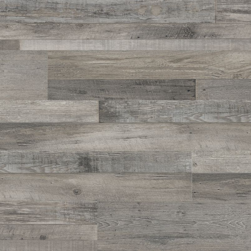 Wooden floor with varied shades of gray and brown planks arranged in a horizontal pattern.