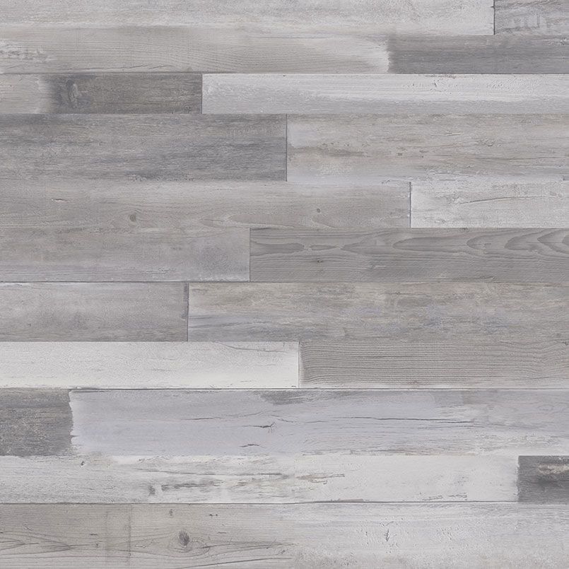 Gray and white weathered wood paneling, horizontal planks, varying shades.