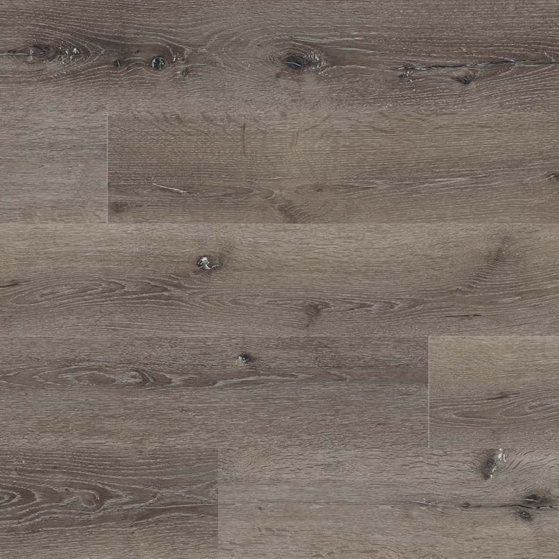 Close-up of weathered gray-brown wood flooring with knots and grain detail.