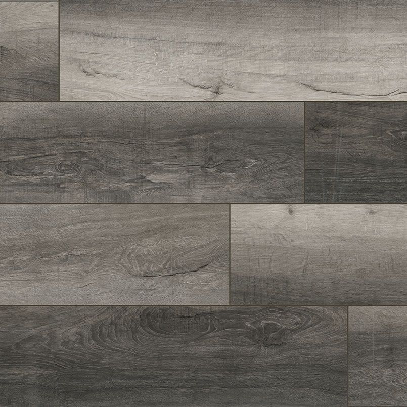 Gray wood-look flooring with varying shades and wood grain patterns.