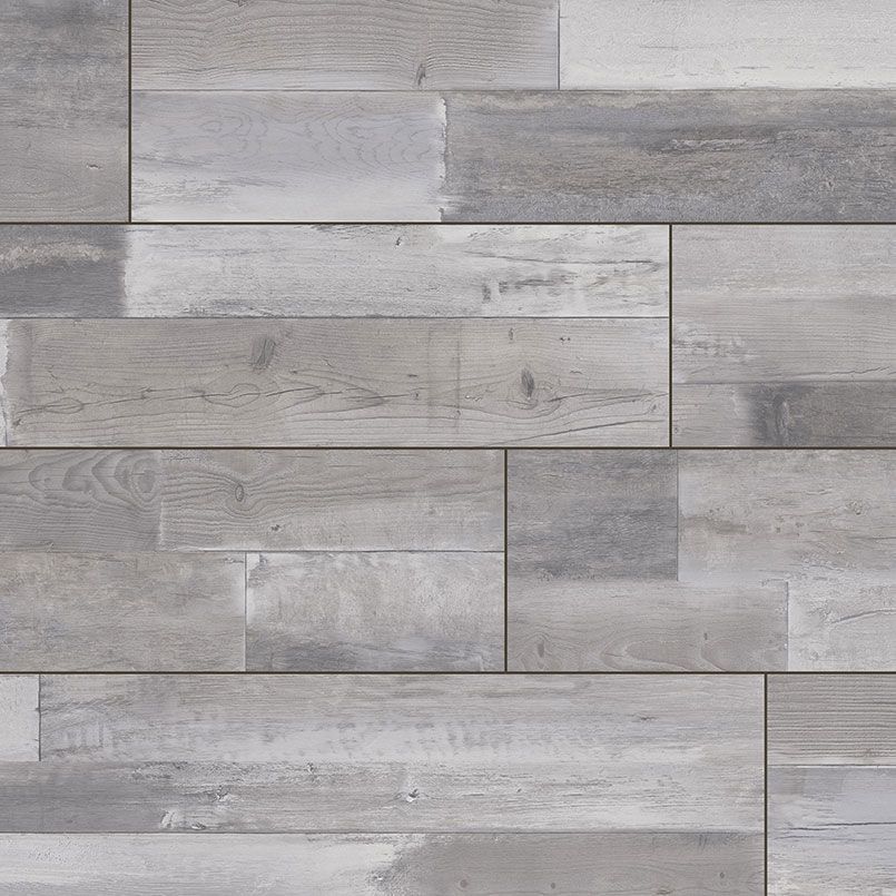 Gray and white wood plank flooring, arranged in a staggered pattern.
