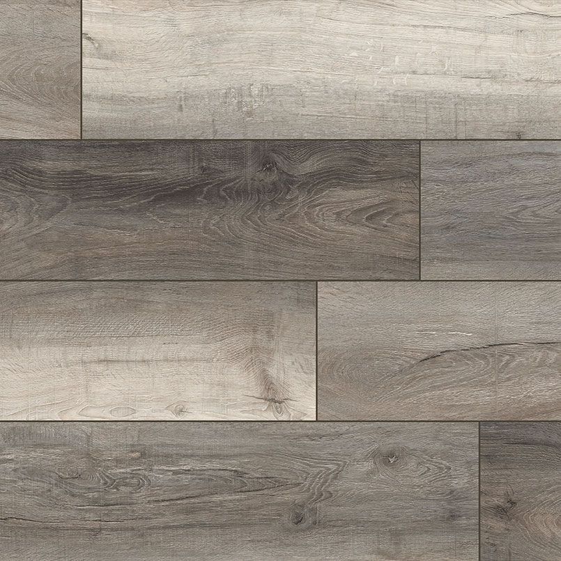 Wooden flooring with variations in gray and brown tones.