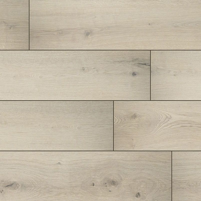 Light-colored wooden floor planks with a natural grain pattern, arranged in a staggered pattern.
