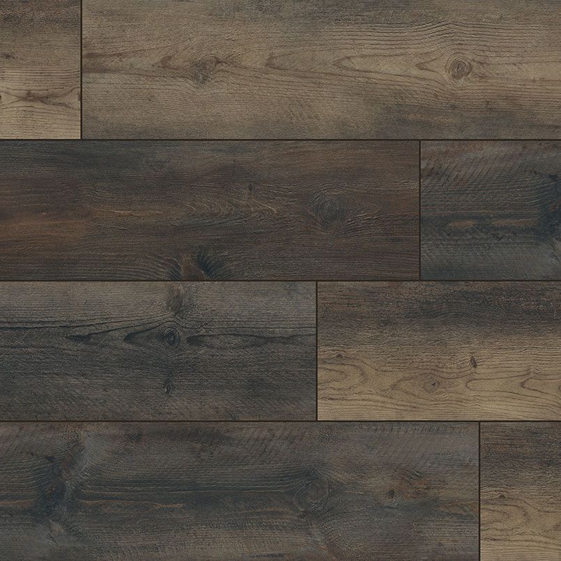 Dark brown wooden floorboards, arranged in a staggered pattern.