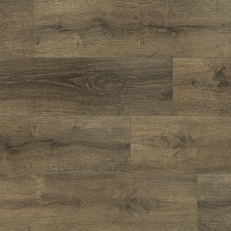 Close-up of weathered, brown wood flooring.