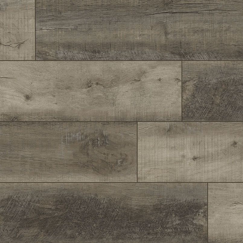Gray and brown plank flooring, wood-look with variations in tone and texture, installed pattern.