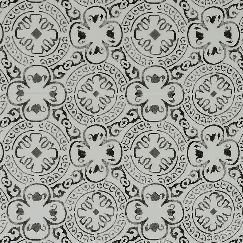 Patterned tile with gray floral and geometric designs.