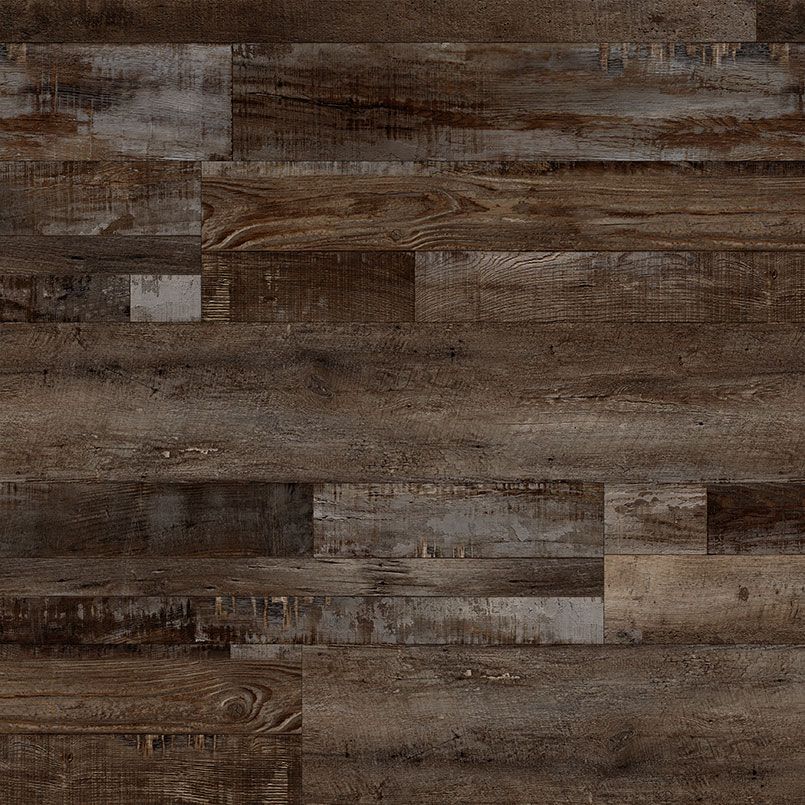 Dark, rustic wood flooring with varying shades of brown and gray.