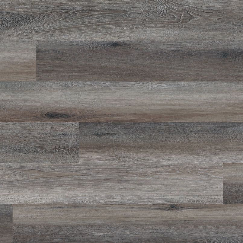 Grey-toned wood plank flooring with varying shades of brown and gray.