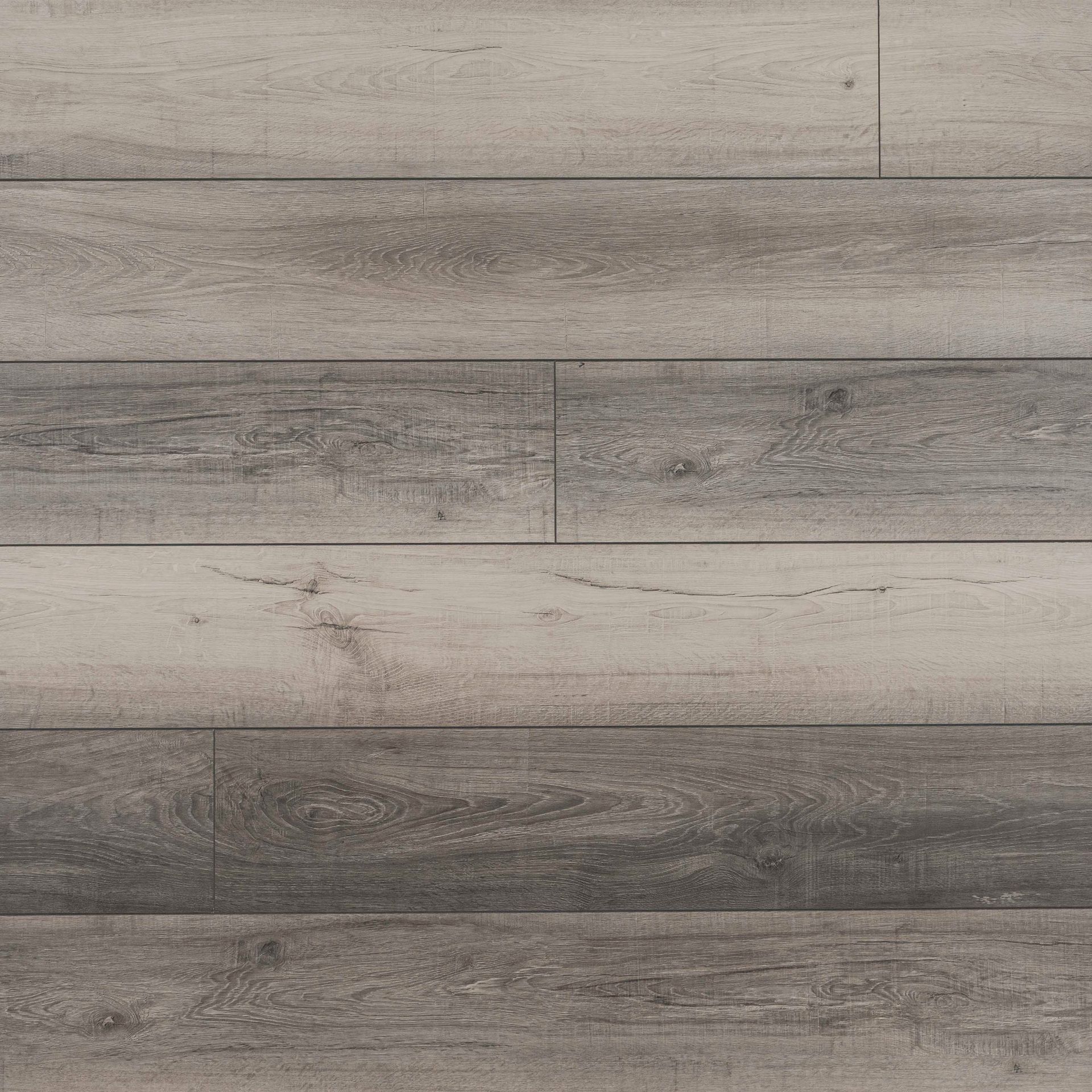 Gray wood-look flooring with varying shades and wood grain texture.