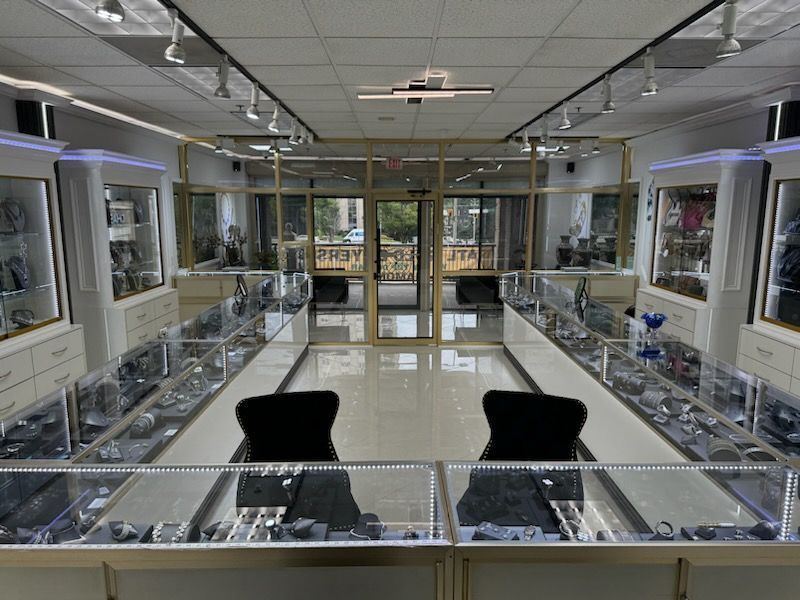 The inside of a jewelry store with lots of displays