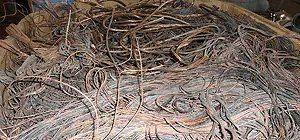 Pile of tangled, rusty-looking wires.