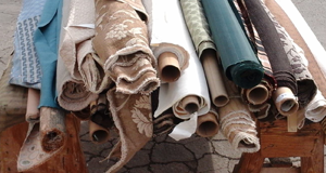Ajram-Upholstery-and-Fabrics-spools-of-fabric
