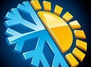 Blue snowflake and yellow sun split icon on dark blue background