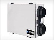 White YORK HVAC unit with two black circular vents on the side