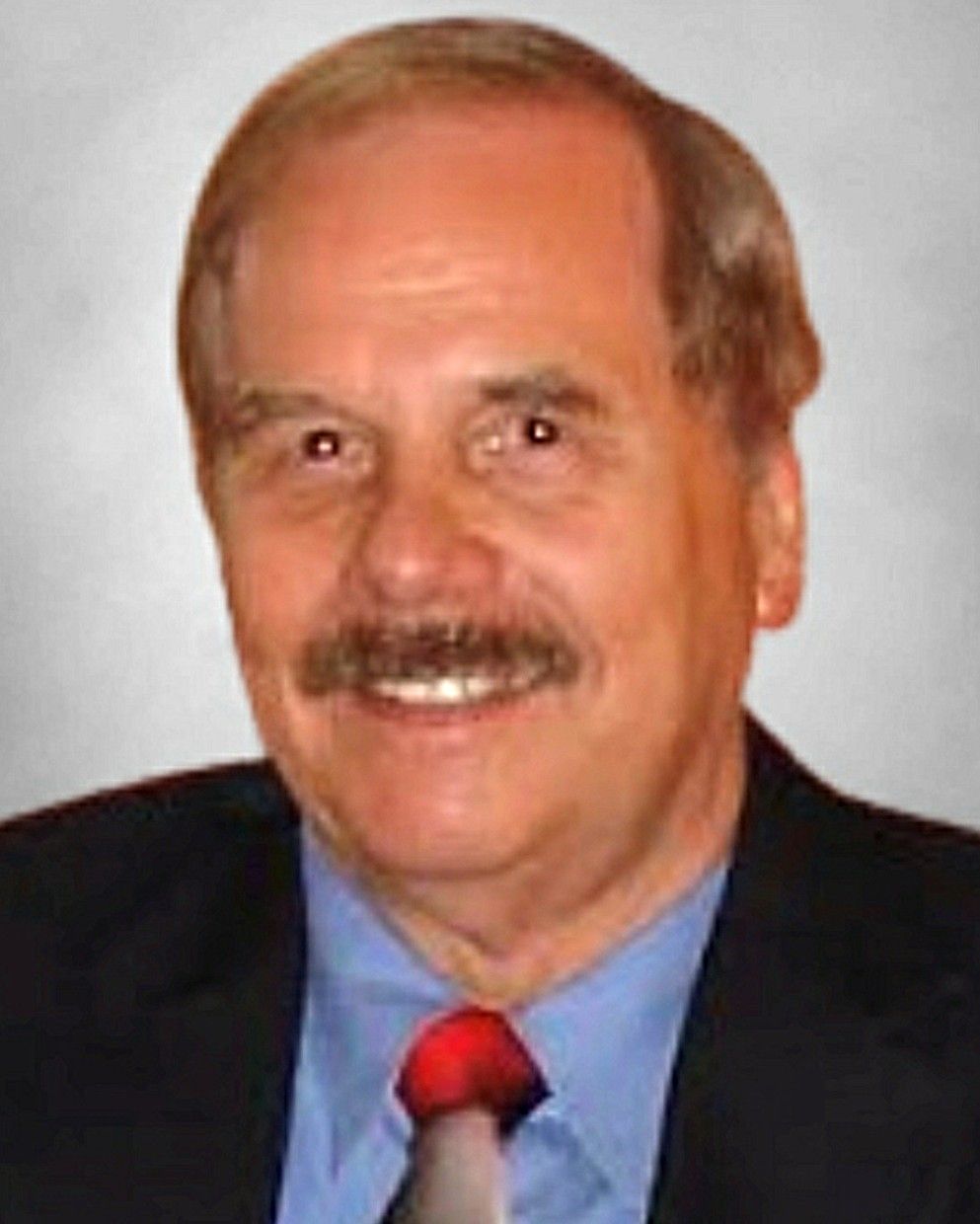 John F. Melvin 