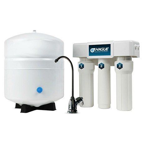 A water filter with a tank and a faucet attached to it.