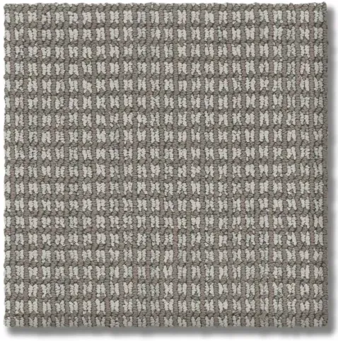 Gray and white patterned carpet tile with a textured surface.
