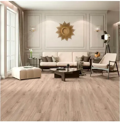 Living room with wood flooring, beige walls, sofa, chair, and coffee table. Sunburst mirror decorates the wall.